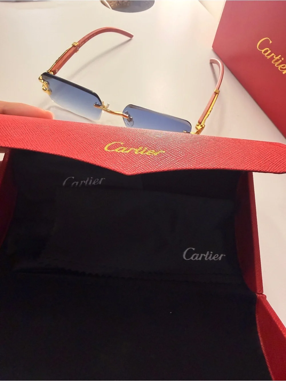 Cartier Men’s Rimless Sunglasses with Blue Gradient Lenses and Gold Accents